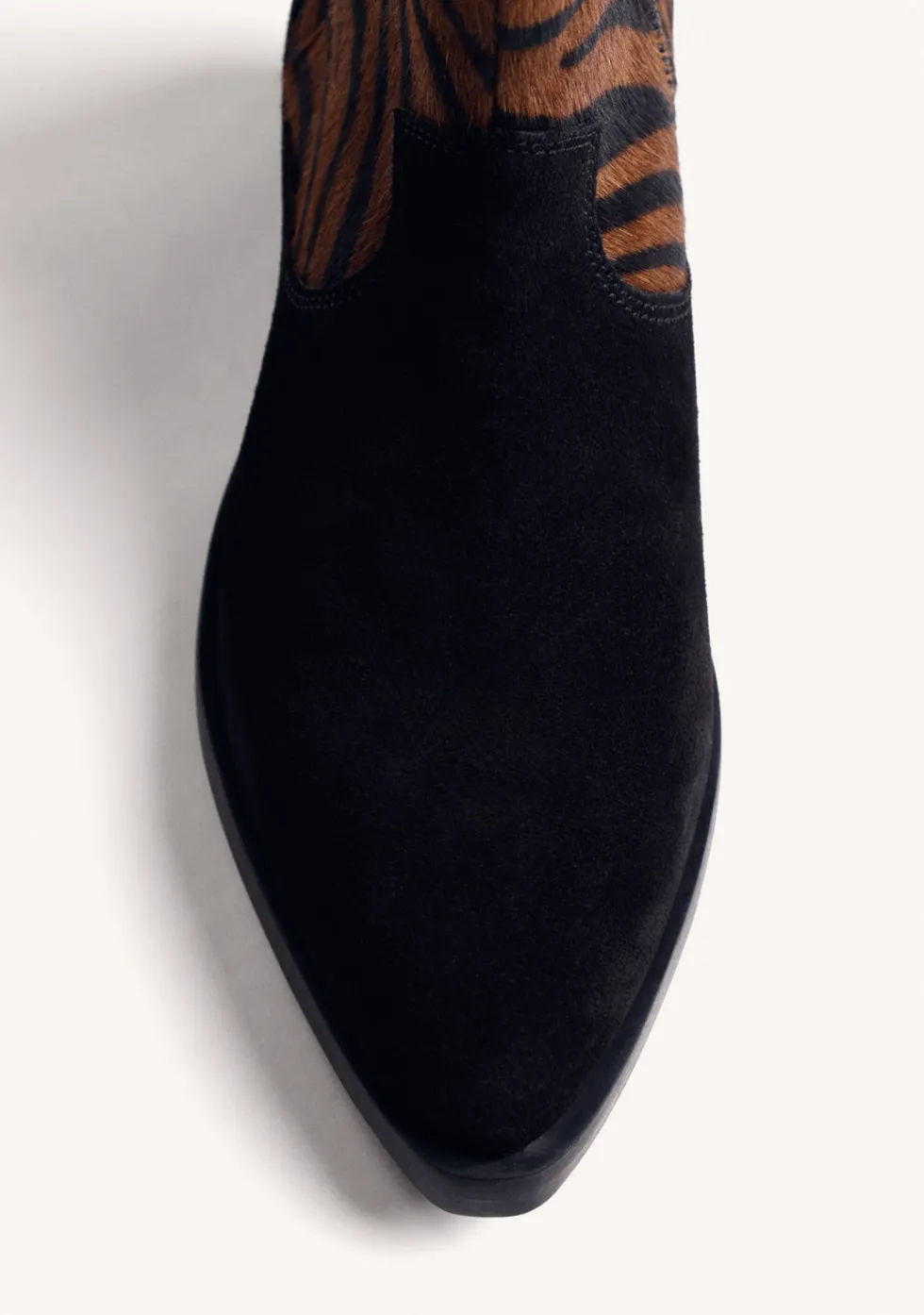 BOTINES ESTAMPADO ANIMAL PIEL