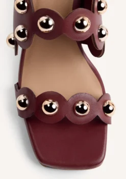 SANDALIAS TACÓN PIEL TACHAS KAKUMA